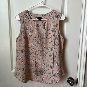 Light pink blouse with blue and white floral pattern